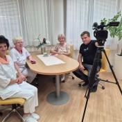 Zaposleni med snemanjem interne TV